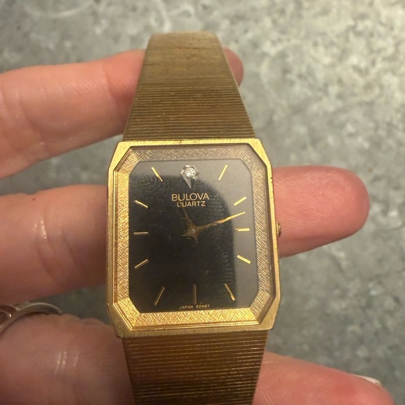 Bulova Other - Bulova Gold and Black Quartz Watch
